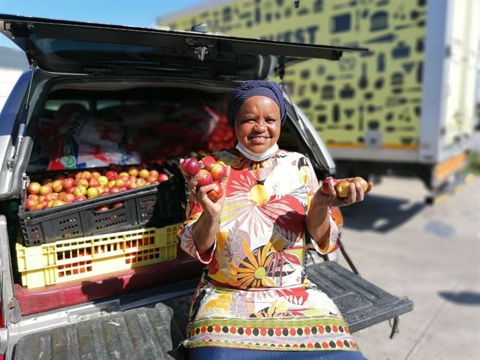 A representative of NPO Give Food Solutions, one of SA Harvest's Cape Town beneficiaries.
