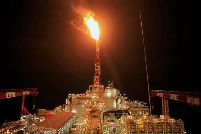 Kaombo Norte floating oil platform is seen at night off the coast of Angola. 2018. Source: Reuters/Stephen Eisenhammer