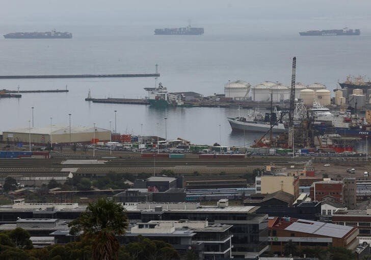 Container ships are seen outside the harbour as workers at state-owned logistics firm Transnet continue to protest outside the Port of Cape Town on their nationwide strike action that could paralyse ports and freight rail services in Cape Town, South Africa, October 17, 2022. REUTERS/Esa Alexander