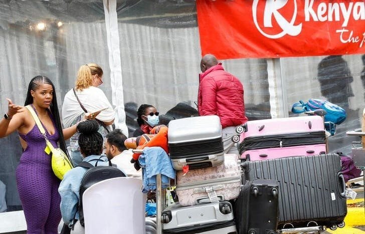 A passenger reacts after her Kenya Airways flight was cancelled during a strike of Kenya Airways pilots, organised by Kenya Airline Pilots Association (KALPA), at the Jomo Kenyatta International Airport in Nairobi, Kenya November 7, 2022. REUTERS/Monicah Mwangi