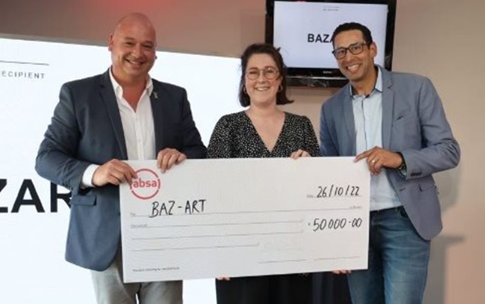 Source: Supplied. Mayoral Committee member for economic growth, Alderman James Vos; Philippa Taylor, office manager at Baz-Art and ex board chairperson Brett Hendricks.