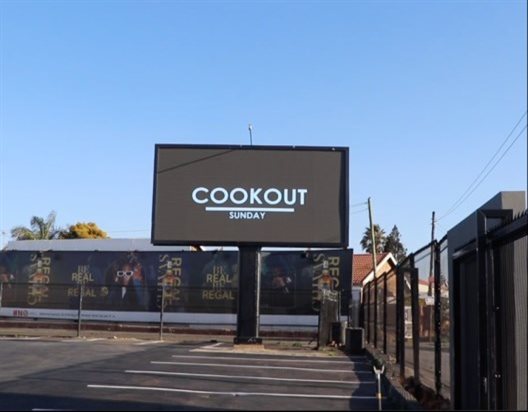 Cookout Sunday on a digital billboard at Konka Day Club in Pimville, Soweto