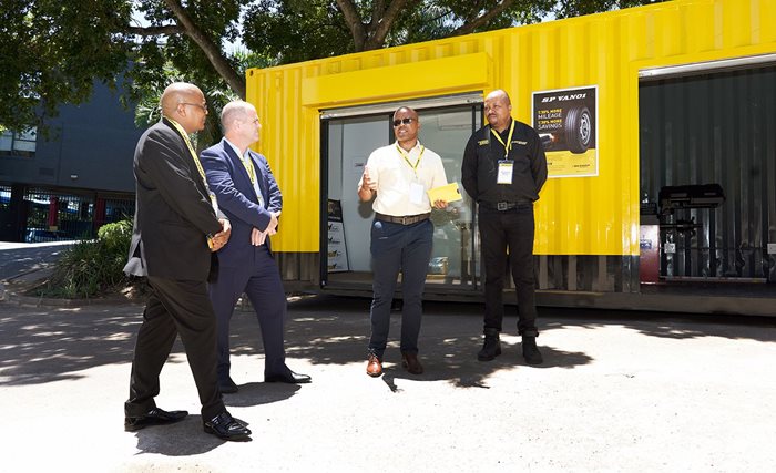 L to R: Sibusiso Ngubane, Deputy Director General in the KwaZulu-Natal Office of the Premier; Lubin Ozoux, CEO of Sumitomo Rubber SA; Victor Mtshali, owner of a Dunlop Container in Mondlo township in the Zululand District Municipality, and Itumeleng Mojafi, group business development manager at Sumitomo Rubber SA.