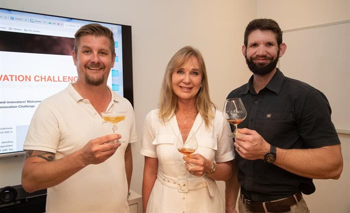 Winners Gary Knoetze and Ronaldo Fourie with Christelle Reade-Jahn, director of the South African Brandy Foundation. Source: Supplied