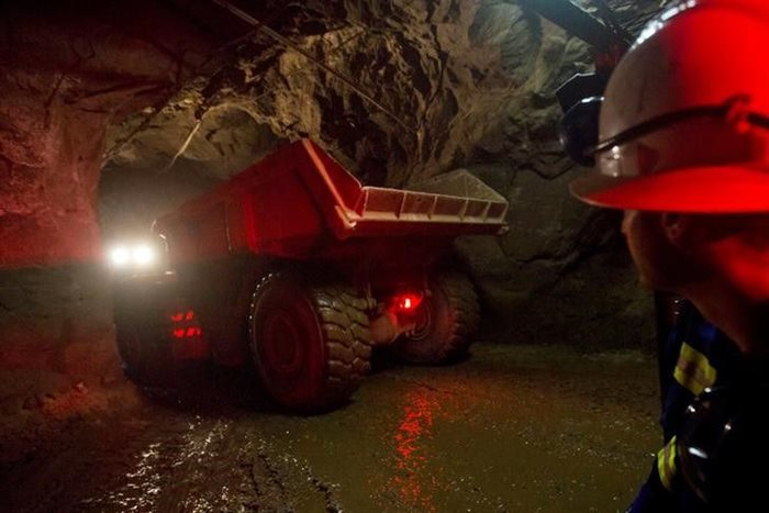 A truck travels to a depth of 516 metres below the surface to collect ore at the Chibuluma copper mine in the Zambian copperbelt region. Source: Reuters/Rogan Ward