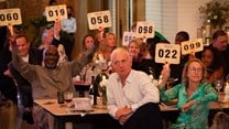Image supplied: Attendees bidding at 2022's Cape Wine Auction
