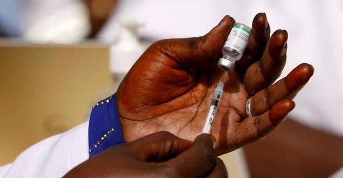 Source: Reuters. A health worker prepares a dose of the coronavirus disease (Covid-19) vaccine in Dakar, Senegal February 23, 2021.