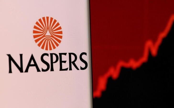 Image: Naspers' logo is pictured on a smartphone in front of stock graph displayed in this illustration taken, 4 December 2021. Reuters/Dado Ruvic/Illustration