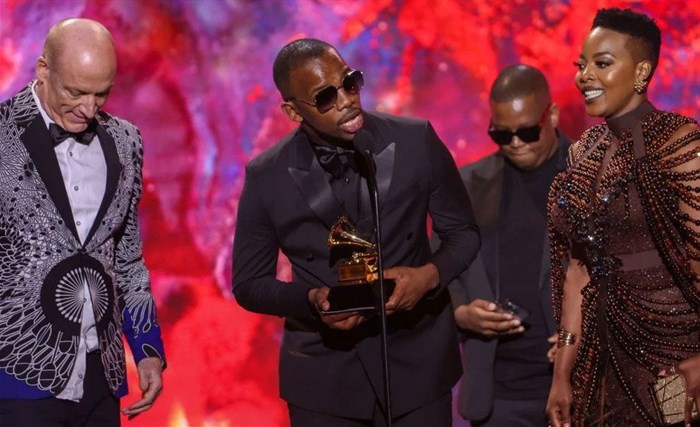 Zakes Bantwini Accepts Grammy. Image credit: Getty Images