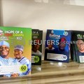 Branded notebooks with images of Nigerian presidential candidates are displayed at a shopping center in Abuja, Nigeria. Source: Reuters/Abraham Achirga.