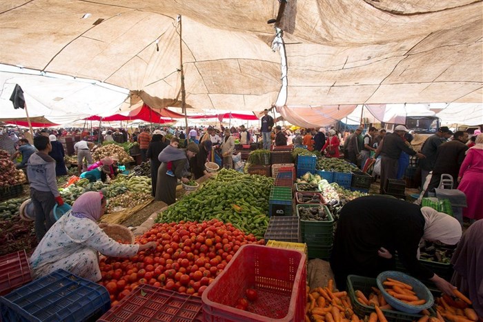 People buy fruits and vegetables at a traditional market in Dar Bouazza on the outskirts of Casablanca, Morocco, May 16, 2018. REUTERS/Youssef Boudlal