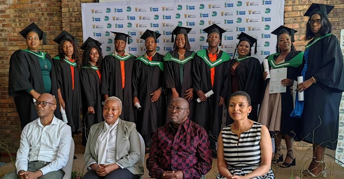 Source: Supplied. Front row: The KNP managing executive, Oscar Mthimkhulu, KNP gerneral manager of finance, Khethiwe Silubane, the deputy minister of tourism, Fish Mahlalela and the chief director of the department of tourism, Lizzy Mathopa. With them at the back are some of the graduates of the Tourism Monitors Training Programme.