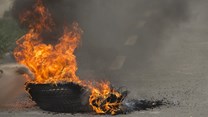 Source: iStock. Police cleared burning tyres at Tshepong Hospital in Klerksdorp on Tuesday (7 March 2023) as Nehawu members picketed outside the hospital.