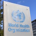 The World Health Organisation (WHO) logo is seen near its headquarters in Geneva, Switzerland, 2 February 2023. Reuters/Denis Balibouse