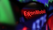 File photo: Exxon Mobil logo and stock graph are seen through a magnifier displayed in this illustration taken 4 September 2022. Reuters/Dado Ruvic/Illustration/File Photo