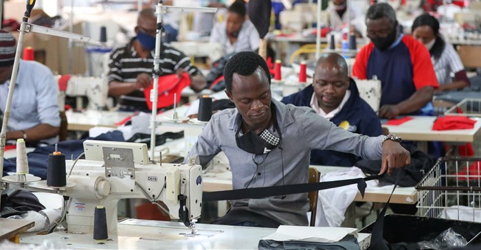 Source: Reuters. People work at ''The Faktory&quot;, a fashion design and clothing manufacturing company in Johannesburg, South Africa.