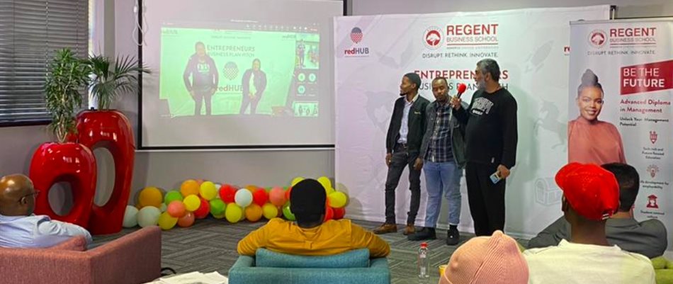 Regent Business School redHub manager, Hoosen Essof (far right) with the Business Plan Pitch Competition winning team Sbu Naapai and Kelvin Khumalo from Shepherds Foodlot.