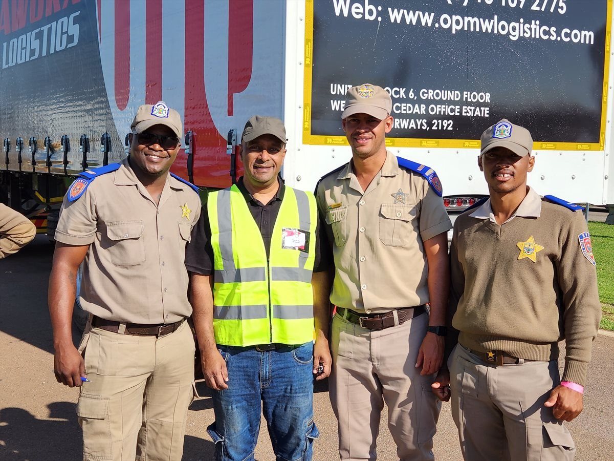 Source: Supplied | Oliver Naidoo, MD of JCA with traffic officials from North West Province.
