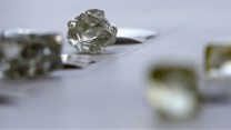 Botswana president insists on bigger share of diamonds from De Beers venture