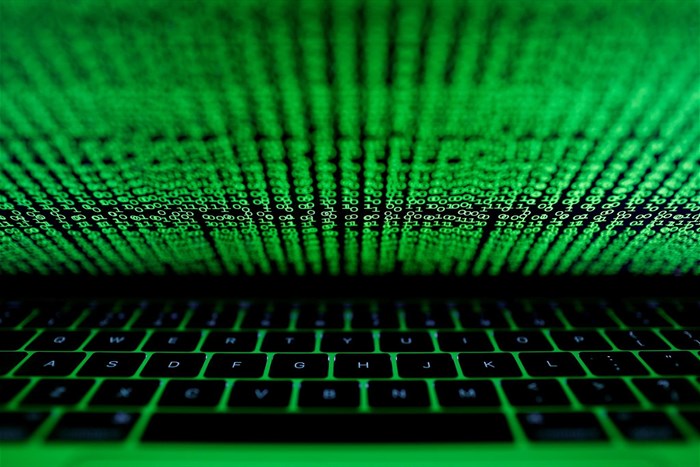 File photo: A computer keyboard lit by a displayed cyber code is seen in this illustration picture taken on 1 March 2017. Reuters/Kacper Pempel/Illustration/File Photo