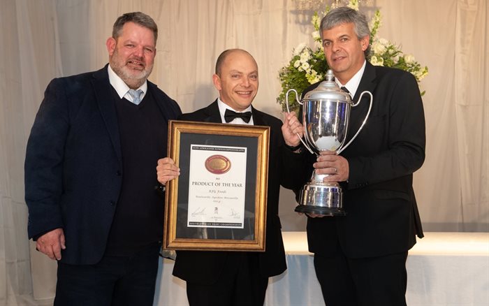 From left to right: Dr Tertius Cilliers, CEO of Synercore (platinum partner); Robert Sudell, operations manager of RFG Foods; and Pieter van Wyk, president of Agri-Expo pose with the SA Dairy Product of the Year trophy. Credit: Agri-Expo/Andrew Gorman Photography