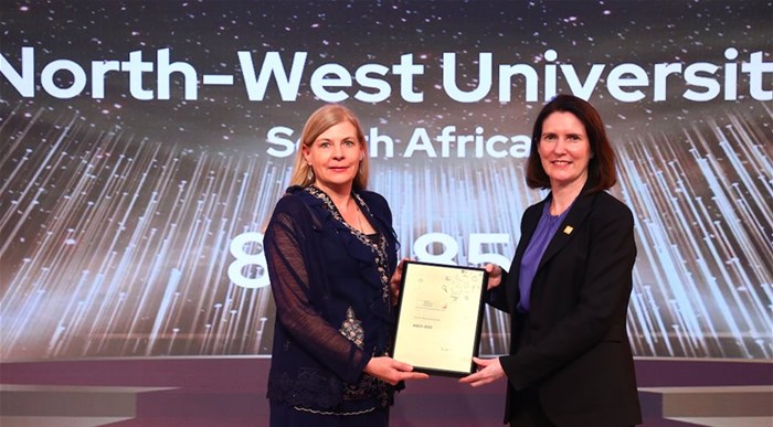 Prof Linda du Plessis (left), deputy vice-chancellor for Planning and Vanderbijlpark Campus Operations, receives the QS award from Jessica Turner, chief executive officer of QS, during the ceremony in Dubai