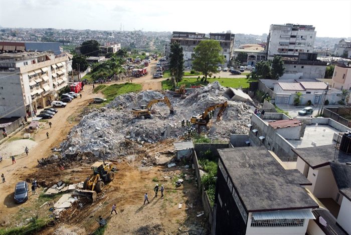 Aerial view of the rubble of a collapsed building under construction in Abidjan, Côte d'Ivoire. 1 July 2023. Source: Reuters/Luc Gnago