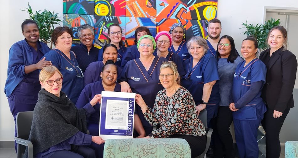 The Cure Day Hospitals Bellville team that drove the accreditation process enjoys the moment of receiving its third Cohsasa accreditation certificate