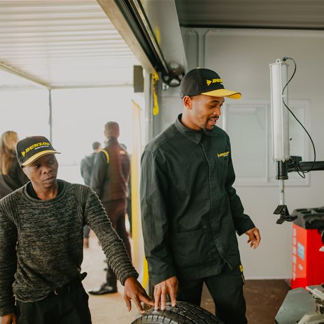 Emmanuel Shandu, left, and Sthembiso Kunene are the two newly employed tyre technicians at Simunye Fitment Centre