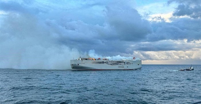 FILE PHOTO: Smoke rises as a fire broke out on the cargo ship Fremantle Highway, at sea on July 26, 2023. Coastguard Netherlands/Handout via REUTERS/File Photo