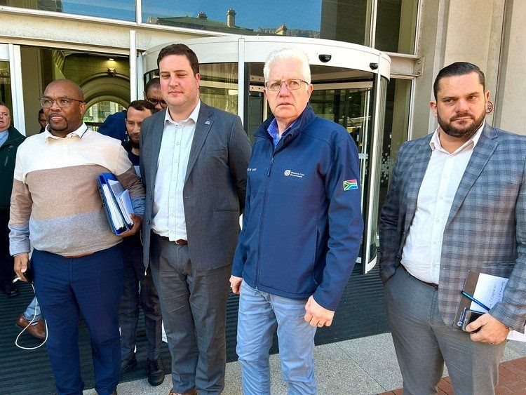 From left: MEC for Mobility Ricardo Mackenzie, Cape Town Mayor Geordin Hill-Lewis, Western Cape Premier Alan WInde and the Mayco Member for Mobility Roberto Quintas. They addressed the media after a long meeting with Santaco’s leadership on Thursday. Photo: Matthew Hirsch