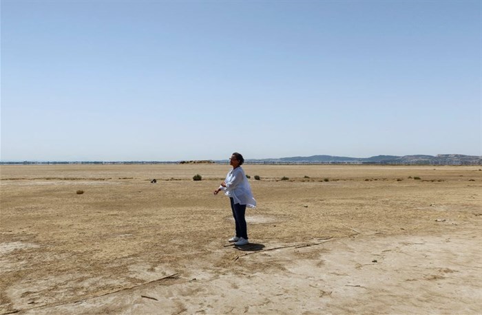 Tunisian environmental activist, Radhia Haddad, stands on the dried-out Ariana lagoon, in Ariana, Tunisia 11 August 2023. Reuters/Jihed Abidellaoui