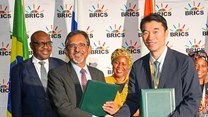 Source: IDC. Bank of China chief executive officer, Longjian Chen seen here with SA's minister of trade and industry, Ebrahim Patel signing in the new framework agreement.