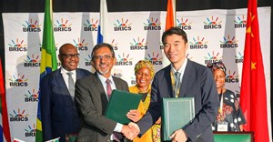 Source: IDC. Bank of China chief executive officer, Longjian Chen seen here with SA's minister of trade and industry, Ebrahim Patel signing in the new framework agreement.