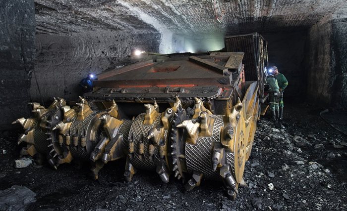 Technicians prepare a machine for the incoming shift in an underground production section of Thungela's Greenside Colliery (formerly Anglo American) in Mpumalanga. Source: Philip Mostert/Anglo American/Handout/Reuters
