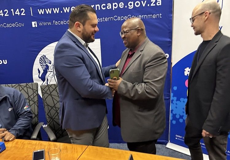 Mayco Member for Urban Mobility Rob Quintas greets Santaco Western Cape deputy chairperson Nceba Enge at a recent joint press briefing following the taxi strike in August. Photo: Matthew Hirsch