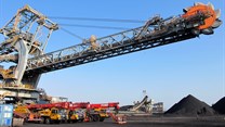One of the two new rail-mounted stacker reclaimers which scoop up and transfer coal into and out of the yard is seen at Africa's largest coal export facility, the Richards Bay Coal Terminal, 2018. Source: Reuters/Tanisha Heiberg