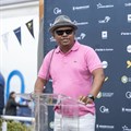 Source: Gallo Images  Sbu Sitole, Loeries chair, in white pants and a pink golf shirt, welcomes delegates to the Mayor's Brunch
