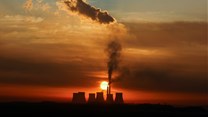 Sun rises behind the cooling towers of Kendal Power Station as the Eskom's ageing coal-fired plants cause frequent power outages, near Witbank. Source: Reuters/Siphiwe Sibeko
