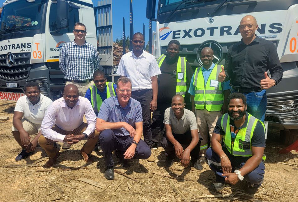 Sanele Mkhize, MD of Exodec (centre, white shirt) surrounded by the Sappi team and his employees.