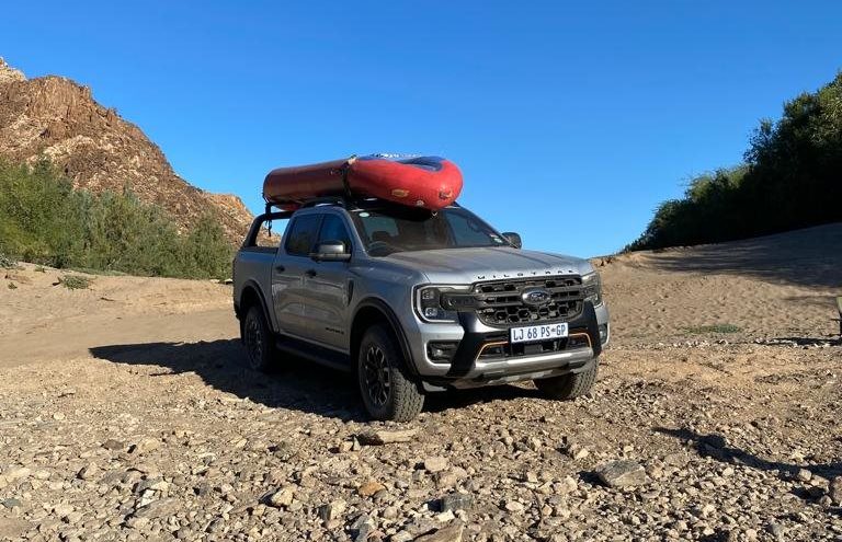 Notice the inflatable boat on top the Wildtrak X, which the new roof rack feature helps hold up | Image credit: Imran Salie