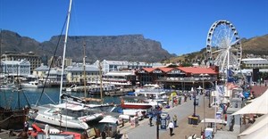 Tourists are returning to South Africa - but the sector will need to go green to deal with the country's electricity crisis