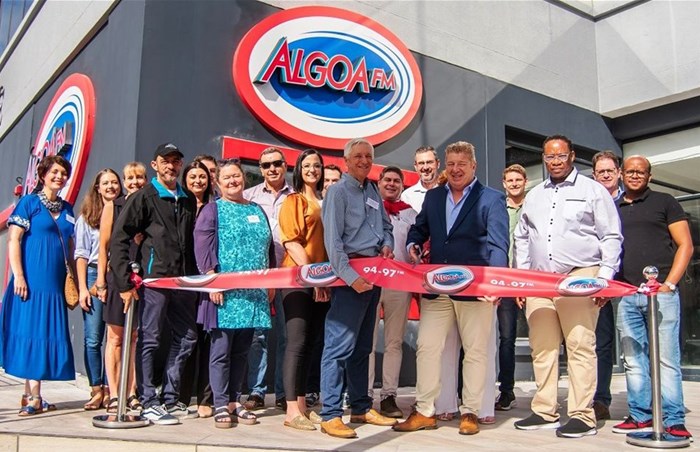 Studio launch 47: Algoa FM managing director Alfie Jay cutting the ribbon at the official opening of the new Algoa FM studio in George. Looking on are local business leaders and Algoa FM staff.