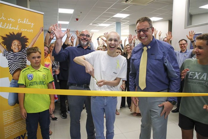 Pictured here from left to right, Johann Riedemann (Jnr), Dr Ernst Marais, COO of Icon Oncology, Ruben van Rooyen who officially opened the unit on the last day of his chemotherapy treatment for rhabdomyosarcoma, Dr Johann Riedemann, oncologist and founder of the Crayon unit, and Stiaan van Rooy, who celebrated the opening with a ribbon-cutting ceremony.