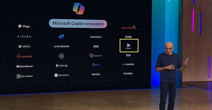 Microsoft CEO Satya Nadella mentions Autopilot Workflow Solutions as part of the Copilot ecosystem on stage at Microsoft Ignite.