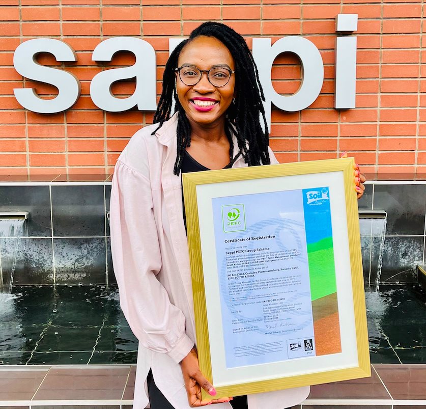 Divisional environmental manager for Sappi Forests, Hlengiwe Ndlovu proudly displays the PEFC Certificate received for Sappi’s first small growers’ Group Scheme certification