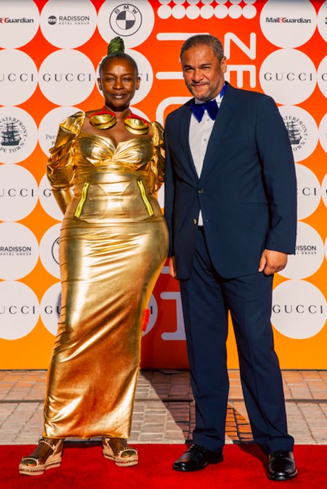 Koyo Kouoh, executive director and chief curator, dressed in XULY.Bët with accessories by L’Artisane and shoes by Christian Louboutin, and Fawaz Mustapha, chief operating officer, at Zeitz Mocaa. Image: Mad Little Badger, courtesy of Zeitz Mocaa