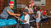 Image supplied. FBS and Education Africa distribute Christmas gifts