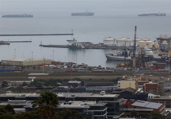Container ships are seen outside the harbour as workers at South Africa's state-owned logistics firm Transnet continue to protest outside the Port of Cape Town on their nationwide strike action that could paralyse ports and freight rail services in Cape Town, South Africa, October 17, 2022. REUTERS/Esa Alexander/File Photo