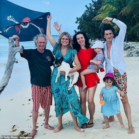 Source: © Instagram @SallyWood. The Rolling Stones rocker Keith Richards was inundated with well wishes from his loved ones on his 80th birthday on Monday (L-R: Keith, wife Patti Hansen, his bandmate Ronnie Wood's wife Sally and Ronnie, along with Sally and Ronnie's twins Gracie Jane and Alice Rose, seven)